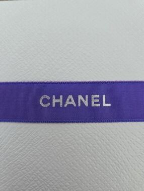 CHANEL Violet Ribbon with Silver Logo